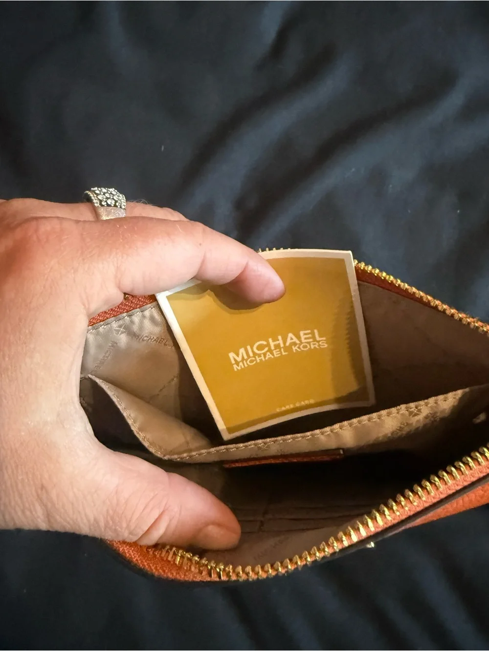 Michael Kors Orange Pebbled Leather Wristlet Clutch